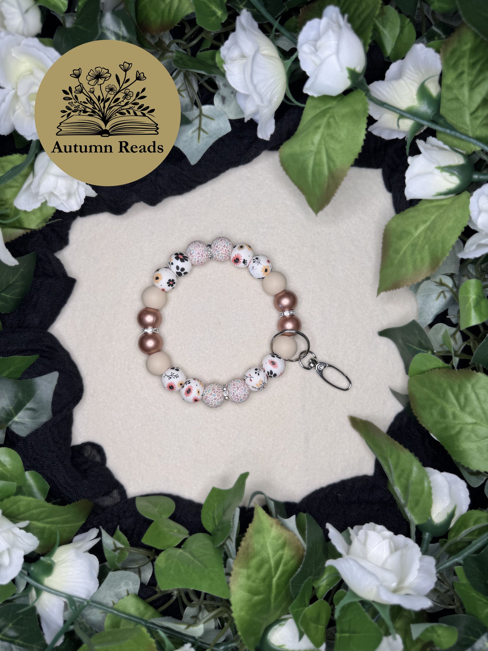 Becca’s Out for a Walk handmade beaded keychain with neutral beads and warm metallic accents by Autumn Reads LLC