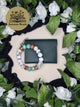 Debby's Forest Ferns handmade beaded keychain paired with a green faux leather wallet by Autumn Reads LLC