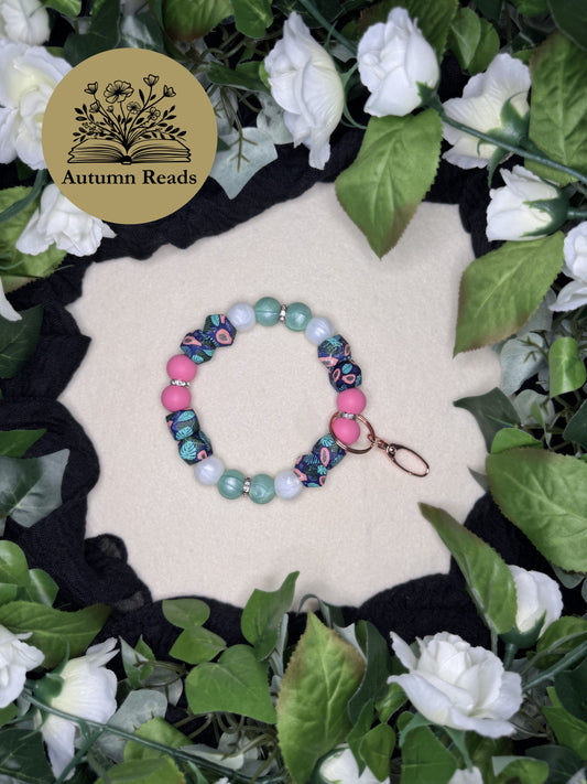 Fresh Papaya handmade beaded keychain with bright, playful color palette by Autumn Reads LLC