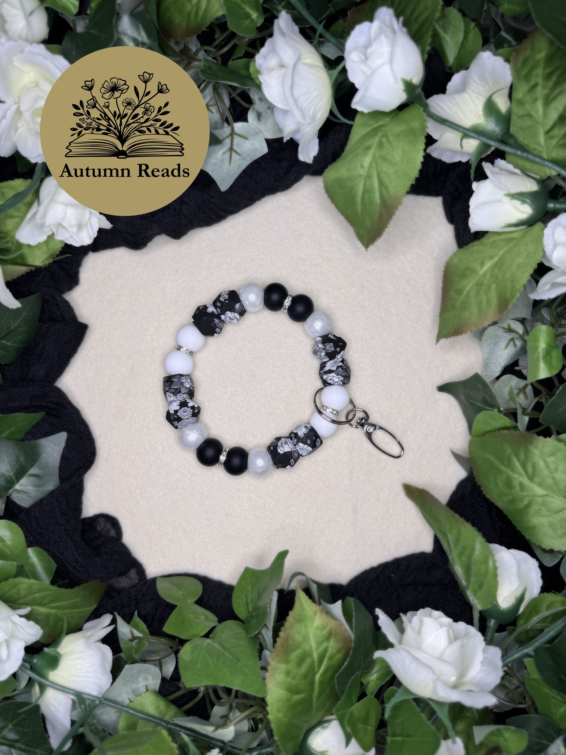 Midnight Flowers handmade beaded keychain with floral accent beads in black and white by Autumn Reads LLC