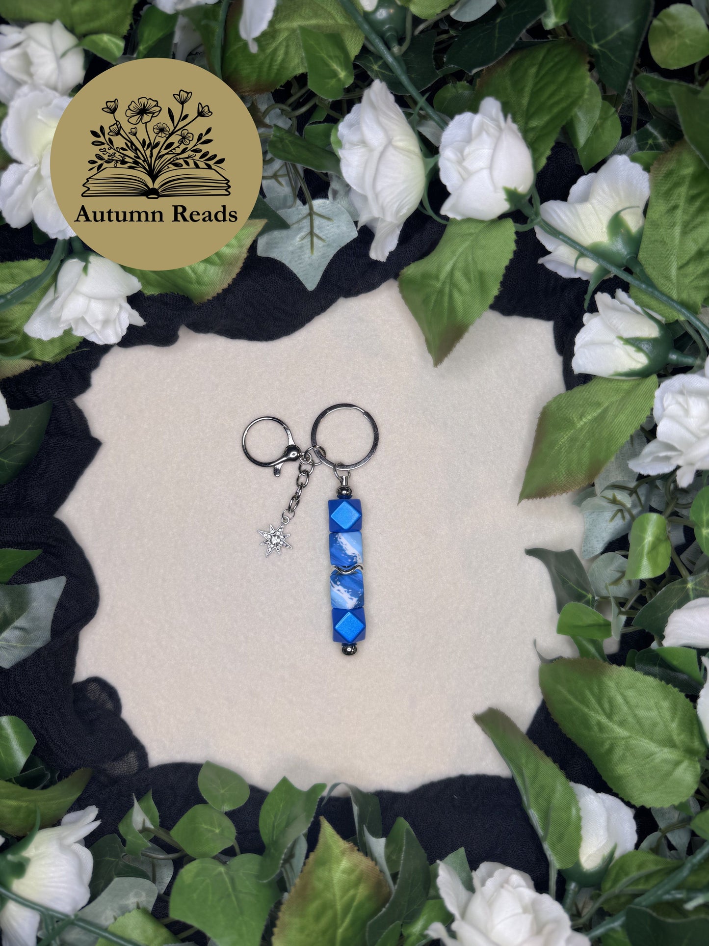 Polaris handmade beaded bar keychain with blue silicone beads and silver star charm by Autumn Reads LLC